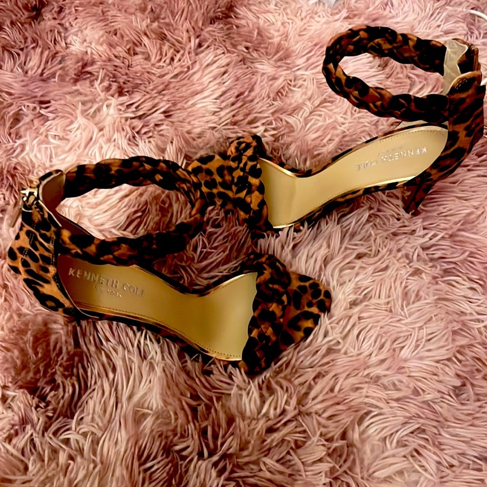 Kenneth Cole cheetah print stilettos. Heel size is 4 inches.